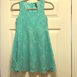 Turquoise flare dress with geometric pattern